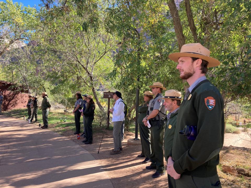 Rangers at Zion National Park line up during a naturalization ceremony held at the park's South Campground Amphitheater on Oct. 18.