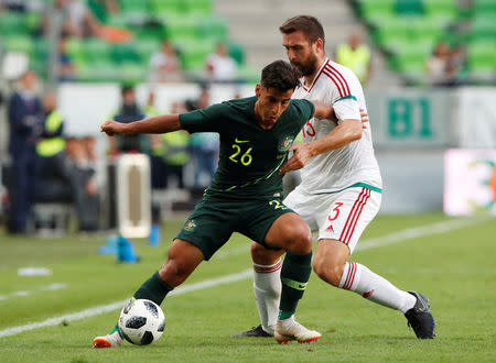 Soccer Football - International Friendly - Hungary vs Australia - Groupama Arena, Budapest, Hungary - June 9, 2018 Australia's Daniel Arzani in action with Hungary's Daniel Bode REUTERS/Bernadett Szabo