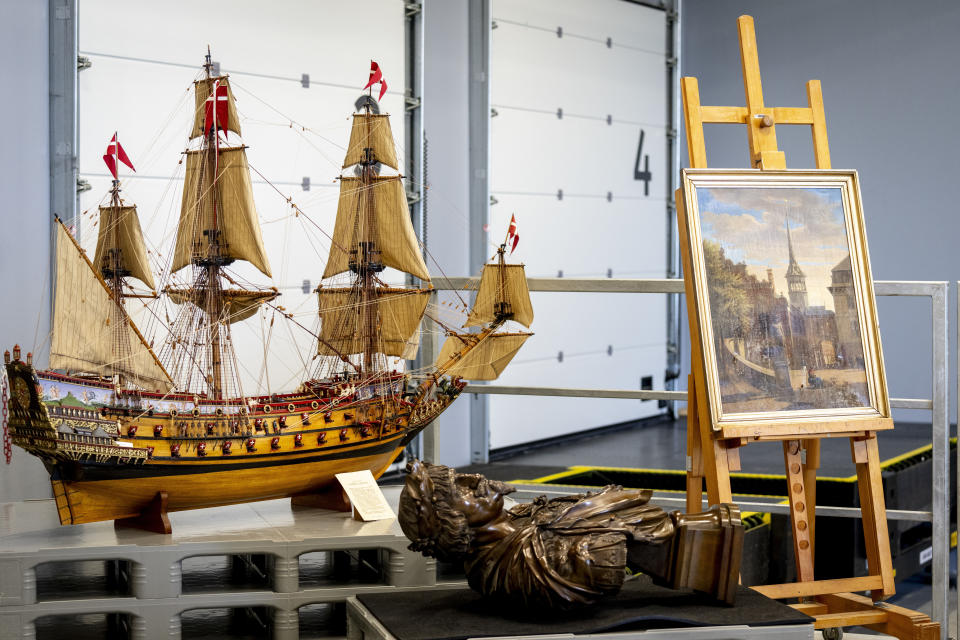 Artworks rescued from Boersen during the fire are displayed at the National Museum's warehouse in Vinge, Denmark, on Tuesday, June 4, 2024. Boersen, in Copenhagen, caught fire on April 16, 2024. More than 300 art objects were saved from the burning building. (Ida Marie Odgaard/Ritzau Scanpix via AP)