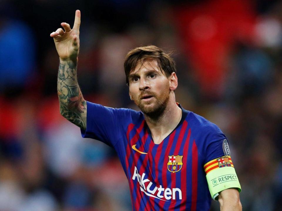 Barcelona's Lionel Messi celebrates scoring (REUTERS)