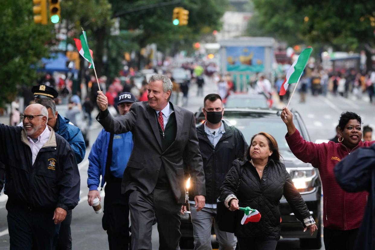 New York City Mayor Bill de Blasio marches in the 44th annual Bronx Columbus Day Parade on Sunday, Oct. 10, 2021.