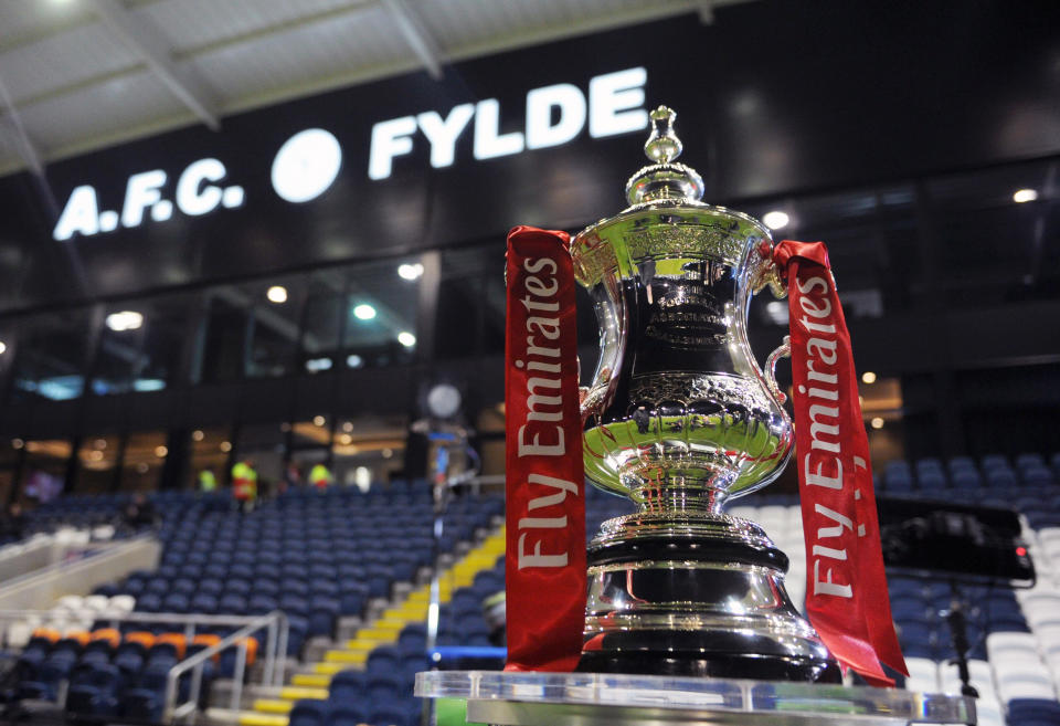 The FA Cup trophy sits pitchside for a match at AFC Fylde. The non-league side almost reached the third round, but fell to Wigan Athletic in a second-round replay. (Getty)
