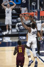 Penn State forward Abdou Tsimbila (30) dunks against Minnesota during an NCAA college basketball game Wednesday, March 3, 2021, in State College, Pa. (Noah Riffe/Centre Daily Times via AP)