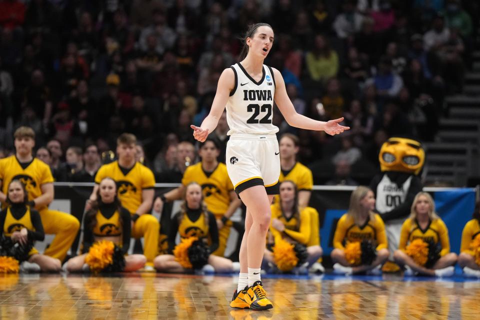 Mar 26, 2023; Seattle, WA, USA; Iowa Hawkeyes guard Caitlin Clark (22) reacts against the Louisville Cardinals in the first half at Climate Pledge Arena. Mandatory Credit: Kirby Lee-USA TODAY Sports