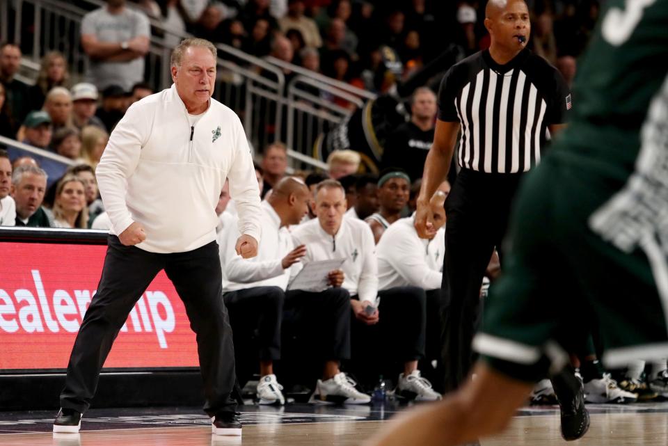 Michigan State Spartans basketball head coach Tom Izzo, left, reacts during the first-ever Acrisure Classic in Palm Desert, Calif., on Thanksgiving Day, Nov. 23, 2023.