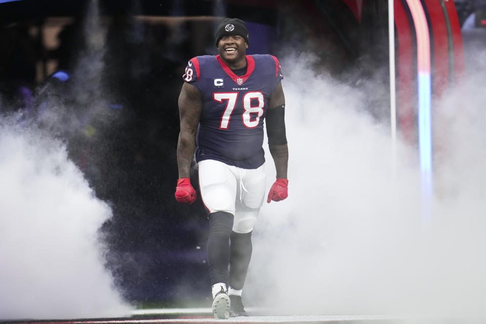 HOUSTON, TX - DECEMBER 18: Laremy Tunsil #78 of the Houston Texans runs onto the field during introductions against the Kansas City Chiefs at NRG Stadium on December 18, 2022 in Houston, Texas. (Photo by Cooper Neill/Getty Images)