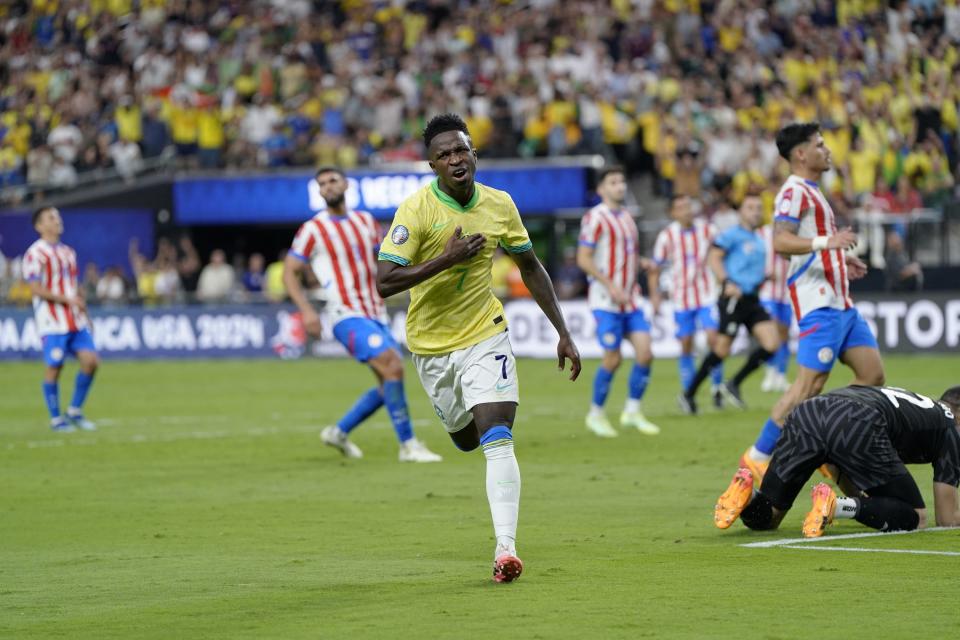 Jun 28, 2024; Las Vegas, NV, USA; Brazil forward Vinicius Junior (7) reacts after scoring a goal against Paraguay during the first half at Allegiant Stadium. Mandatory Credit: Lucas Peltier-USA TODAY Sports