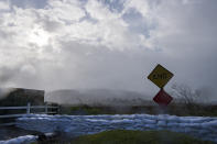 Sandbags in the Carmel Point neighborhood in Carmel, Calif., Monday, Dec. 13, 2021. (AP Photo/Nic Coury)