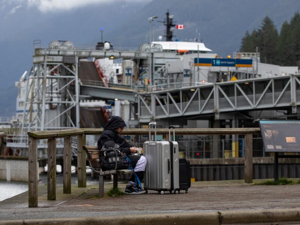 A passenger waits for at B.C. Ferries' Horseshoe Bay Terminal in West Vancouver on Jan. 3, 2020.  (Ben Nelms/CBC - image credit)