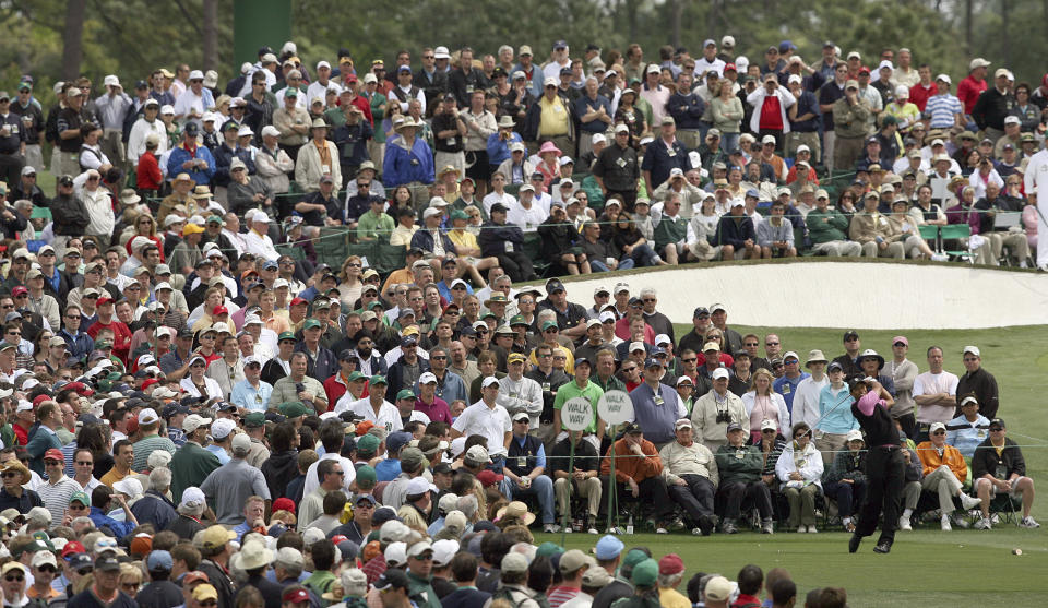 FILE - In this April 5, 2007, file photo, Tiger Woods hits from the third tee during the first round of the Masters golf tournament at Augusta National Golf Club in Augusta, Ga. For the first since a three-year suspension caused by World War II, this tradition unlike any other won't be held in its usual slot on the calendar, where it serves as sort of an unofficial kickoff to spring. (Curtis Compton/Atlanta Journal-Constitution via AP, File)