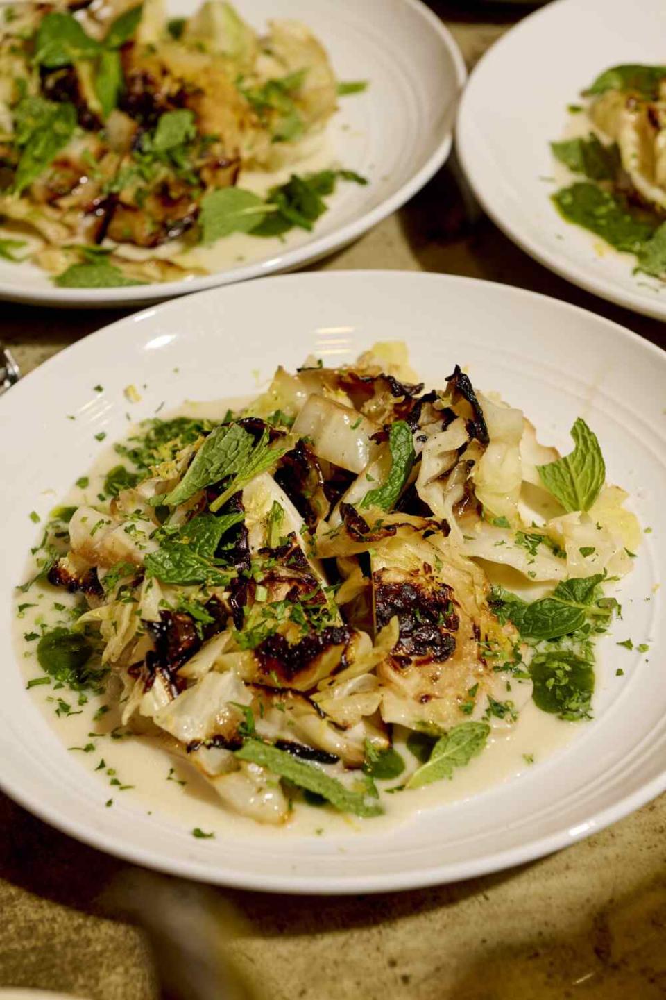 DeVonn Francis prepared charred cabbage steak salad.