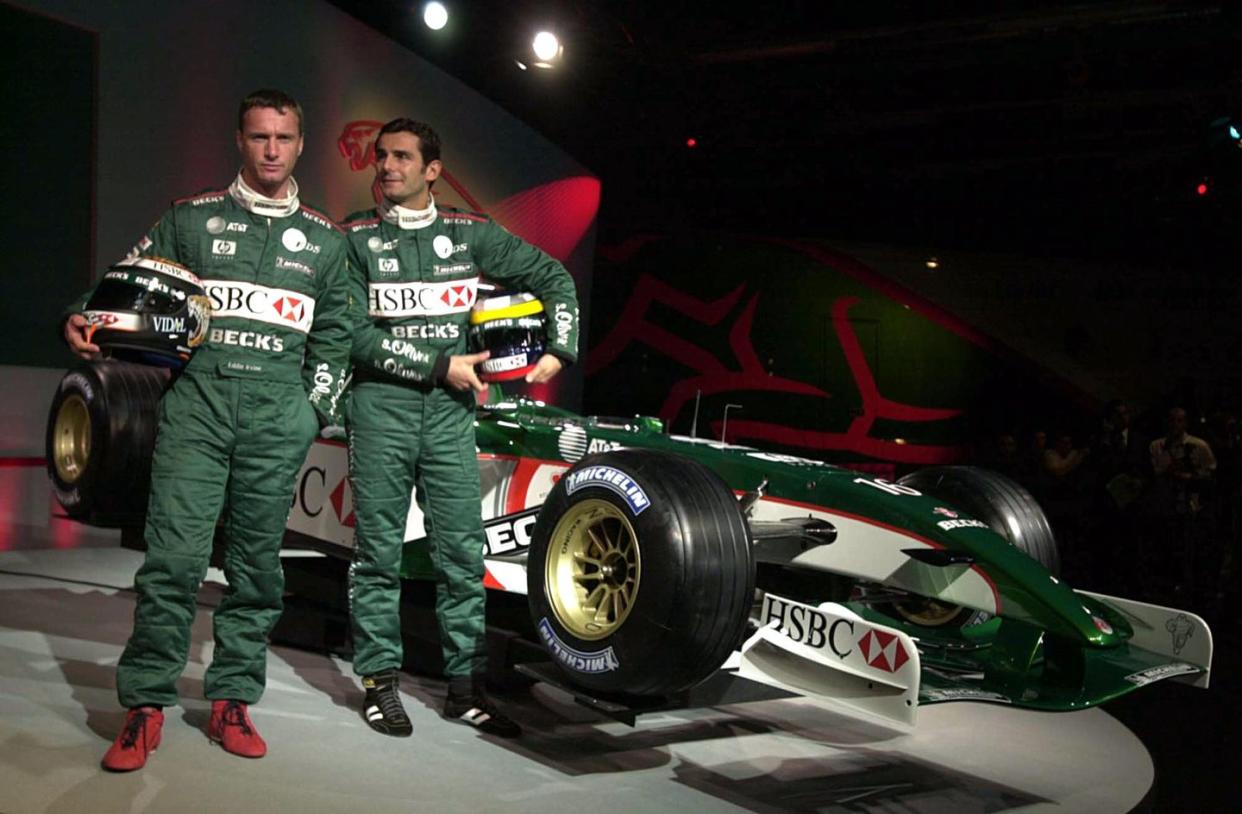 milton keynes, united kingdom eddie irvine of ulster l and pedro de la rosa of spain with their new jaguar r3 formula 1 car at its launch , 04 january 2002, at the companys premises at milton keynes afp photo martyn hayhow photo credit should read martyn hayhowafp via getty images