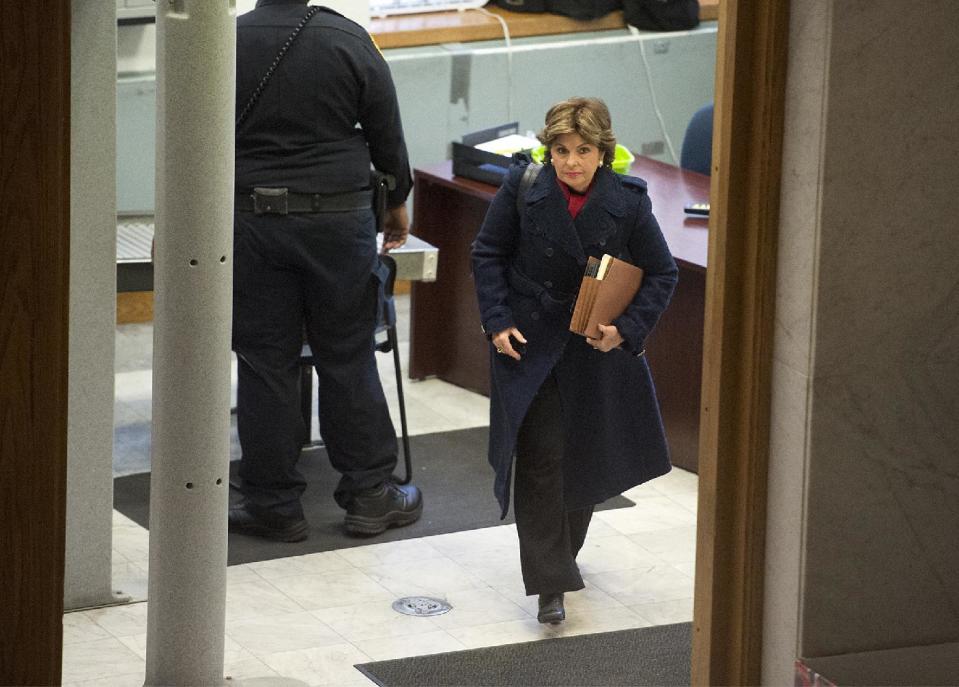 Attorney Gloria Allred walks into the Montgomery County Courthouse in Norristown, Pa., for a pretrial hearing in Bill Cosby's sexual assault case at the Montgomery County Courthouse in Norristown, Pa., Wednesday, Dec. 14, 2016. Cosby is charged with sexually assaulting one woman in 2004, but prosecutors are hoping to call 13 other accusers to testify at his spring trial. (Chloe Elmer/Bucks County Courier Times via AP, Pool)