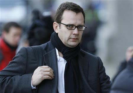 Former News of the World editor Andy Coulson arrives at the Old Bailey courthouse in London January 27, 2014. REUTERS/Suzanne Plunkett