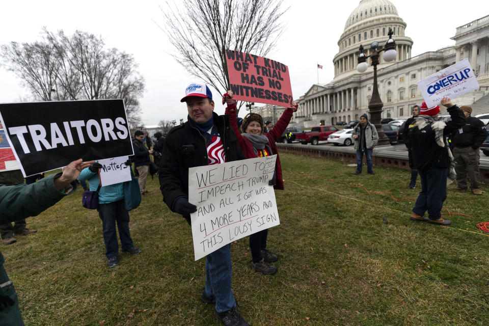 Activists gather on the East Front of the Capitol after the impeachment acquittal of President Donald Trump, on Capitol Hill, Wednesday, Feb. 5, 2020 in Washington. (AP Photo/Alex Brandon)