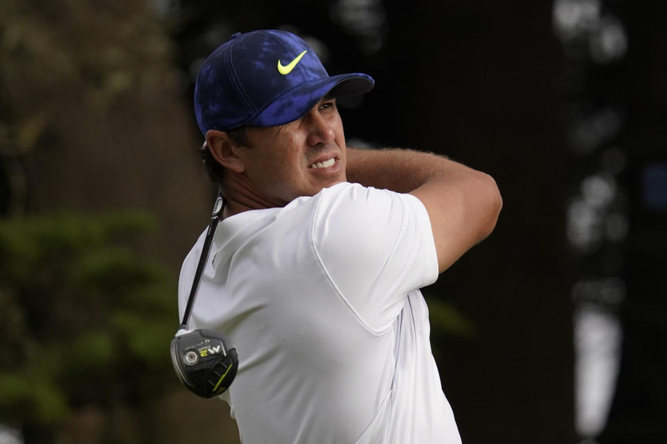 Brooks Koepka watches his tee shot on the 16th hole during the second round of the PGA Championship golf tournament at TPC Harding Park Friday, Aug. 7, 2020, in San Francisco. (AP Photo/Jeff Chiu)