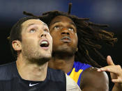 Carlton's Robert Warnock and West Coast's Nic Naitanui prepare to compete