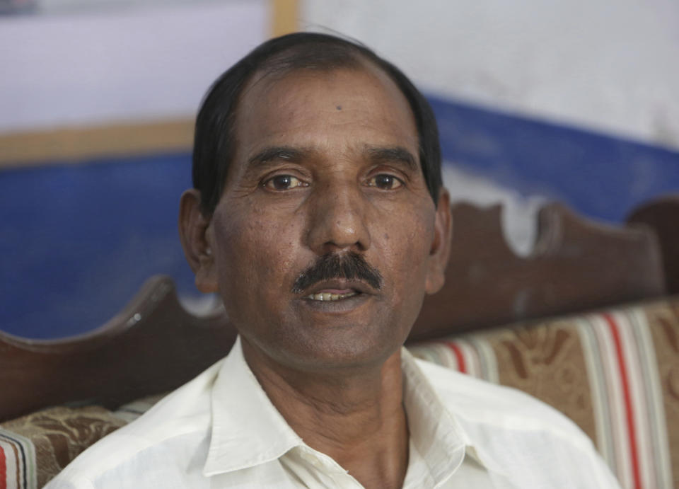 FILE - In this Nov. 6, 2018, file photo, Ashiq Masih, husband of Aasia Bibi speaks to The Associated Press in Lahore, Pakistan. In mid January 2019, Bibi, a Pakistani Christian woman acquitted of blasphemy charges more than two months ago still lives the life of a prisoner, although she was freed from death row by the country’s top court. One of her friends said Bibi’s husband, Masih, who was wounded by a gunshot fired by a protester calling for Bibi’s death, is with her in hiding but their two daughters, Eisham, 20 and Esha, 19 have been spirited out of Pakistan. (AP Photo/K.M. Chaudary, File)