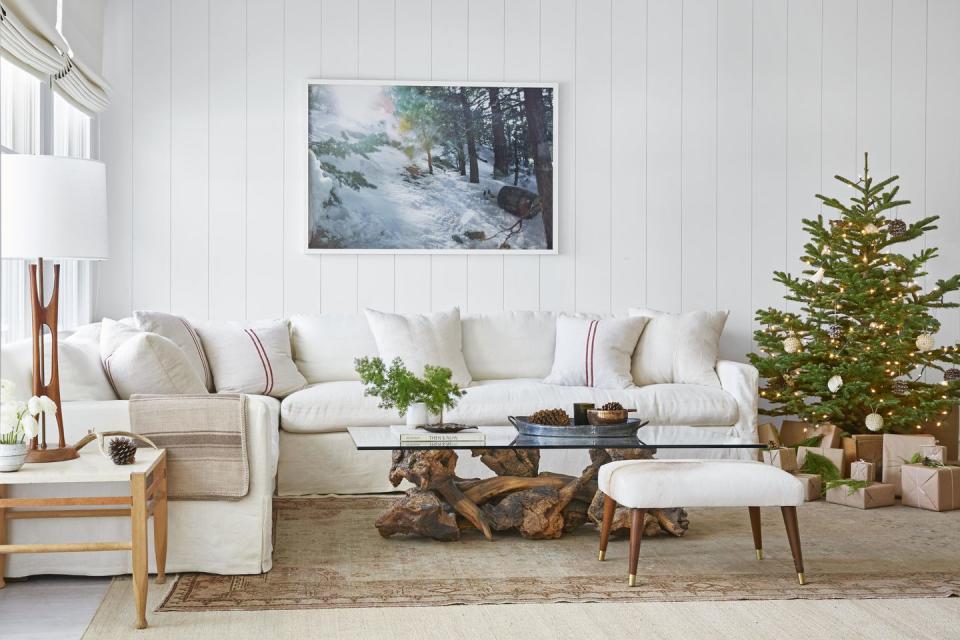 white slipcovered sectional sofa in white family room