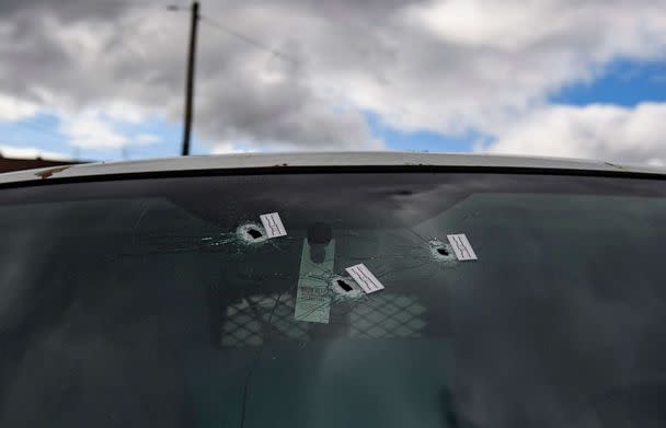 PHOTO: Bullet holes are seen in a van parked outside an Airbnb apartment rental, April 17, 2022, following a shooting at a house party in Pittsburgh. (Jeff Swensen/Getty Images)