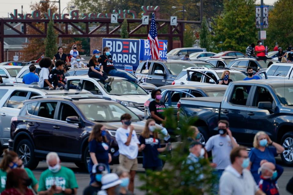 People wait for a campaign event with former President Barack Obama at Citizens Bank Park as he campaigns for Democratic presidential candidate Joe Biden, his former vice president, on Oct. 21, 2020, in Philadelphia.