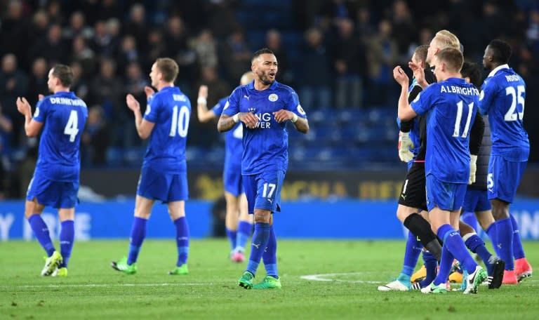 Leicester City's defender Danny Simpson (C) celebrates following the English Premier League football match between Leicester City and Sunderland at the King Power Stadium in Leicester, central England on April 4, 2017