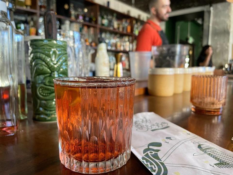 Quail State’s mezcal-based cocktail, Oaxacan on Sunshine, is photographed at the bar’s location in downtown Fresno’s Pacific Southwest Building on June 20, 2023.