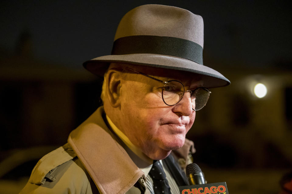 Ed Burke, a powerful Chicago alderman, returns to his home in the Southwest Side of Chicago on Thursday, Nov. 29, 2018, after federal raids on his office earlier in the day. Federal agents executed search warrants at the City Hall office of Burke on Thursday as part of an ongoing investigation, the Chicago Tribune reported. (Brian Cassella/Chicago Tribune via AP)