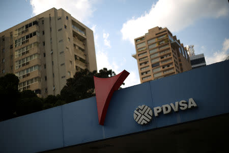 FILE PHOTO: The corporate logo of the state oil company PDVSA is seen at a gas station in Caracas, Venezuela, January 28, 2019. REUTERS/Andres Martinez Casares