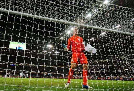 Britain's goalkeeper Jack Butland celebrates winning the London 2012 Olympic Games men's football match between Great Britain and Uruguay at the Millennium Stadium in Cardiff, Wales