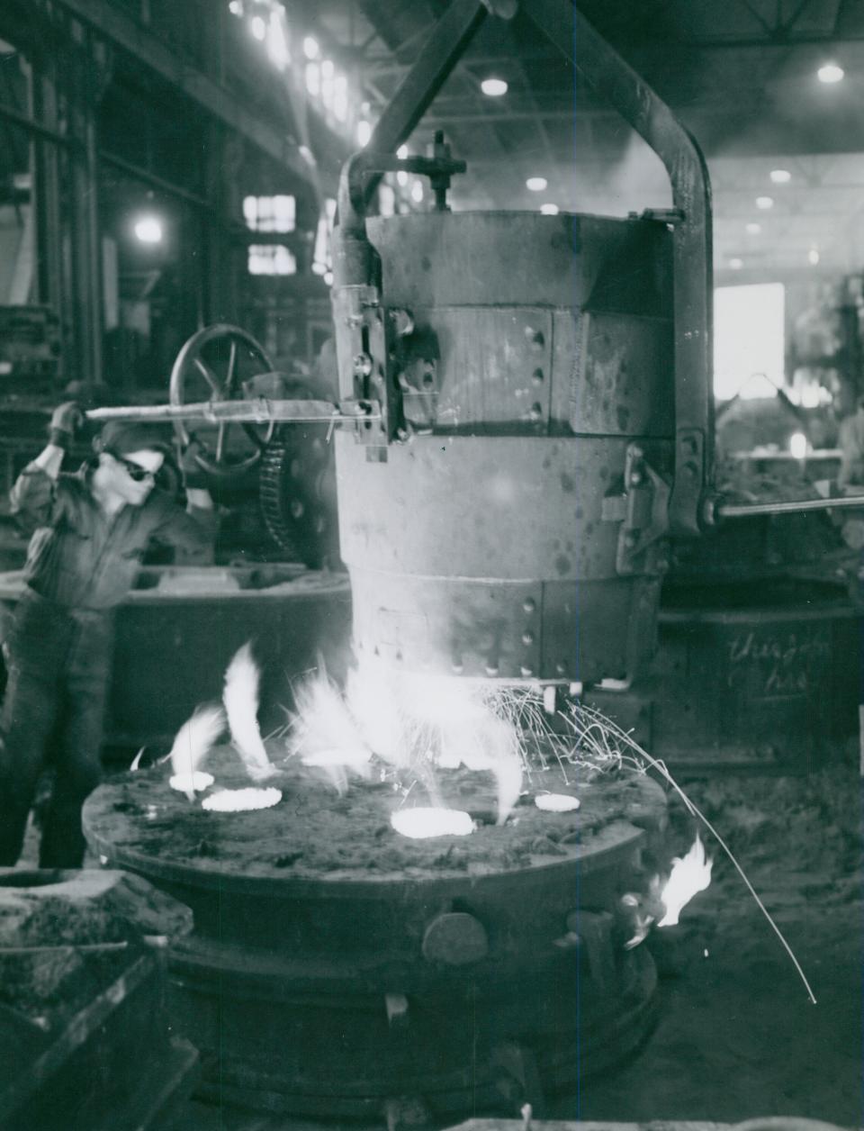 White-hot steel pours into a mold in 1943 at Atlantic Foundry Co. in Akron.