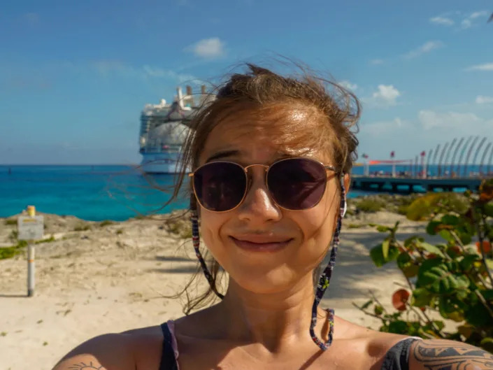 The author takes a selfie in front of the world's largest cruise ship