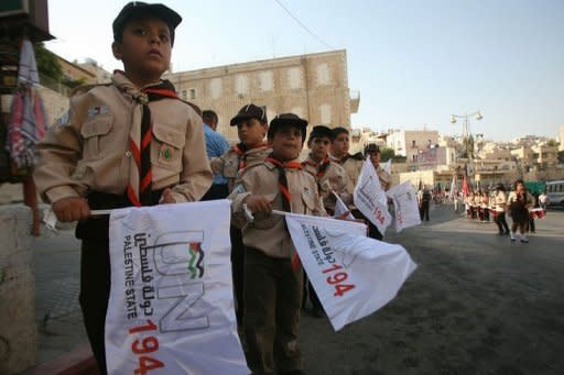 Palestinian scout teams celebrate the centenary of the founding of the Bethlehem Boy Scouts under the slogan: "Yes to the State of Palestine.. UN resolution 194" in the biblical West Bank town. The United States and Europe stepped up a diplomatic scramble Sunday to avoid a UN showdown on the Palestinian plan to seek full UN membership, which the US administration has vowed to veto