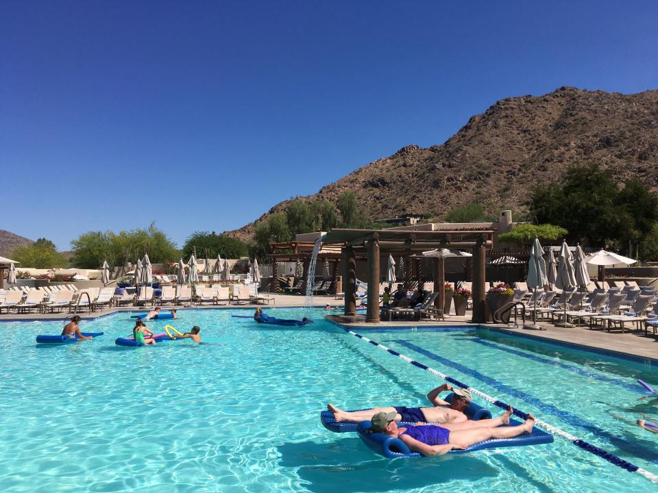 Hotel guests cool off at the pool at the JW Marriott Scottsdale Camelback Inn Resort and Spa in Paradise Valley, Ariz., on Sunday, June 19, 2016.