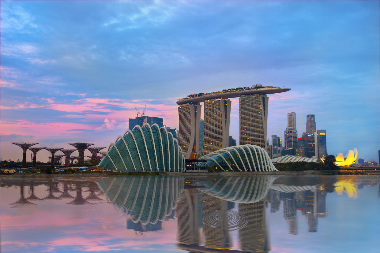 Singapore skyline showing the Marina Bay Sands and Gardens by the Bay.