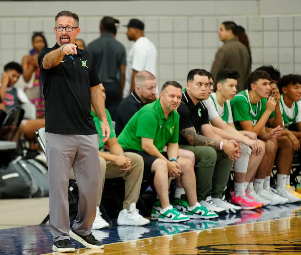 St. Mary’s head coach Damin Lopez instructs his team against Smoky Hill during the Section 7 Basketball Tournament at State Farm Stadium in Glendale on June 23, 2023.