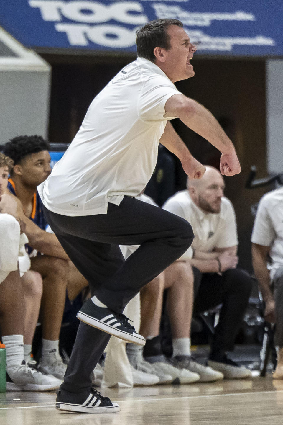 UTEP head coach Joe Golding yells to his players during the first half of an NCAA college basketball game against Western Kentucky at the Conference USA Tournament final, Saturday, March 16, 2024, in Huntsville, Ala. (AP Photo/Vasha Hunt)