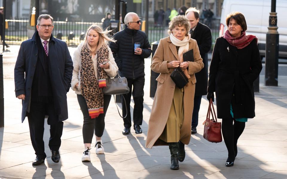 DUP leader Sir Jeffrey Donaldson (left), Baroness Kate Hoey (second right), and former first minister Dame Arlene Foster (right) outside the UK Supreme Court in London this morning - Aaron Chown /PA