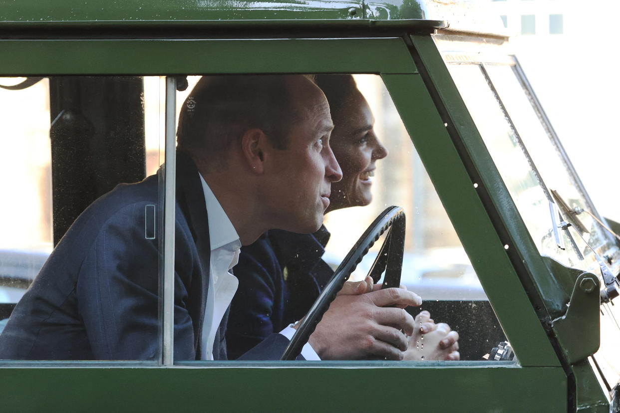 Britain's Prince William, Duke of Cambridge and Britain's Catherine, Duchess of Cambridge arrive in a Land Rover Defender that previously belonged to Prince Philip, Duke of Edinburgh, as they host a drive-in cinema event for NHS staff at the Palace of Holyroodhouse in Edinburgh, Scotland on May 26, 2021, during their week long visit to Scotland. (Photo by Chris Jackson / POOL / AFP) (Photo by CHRIS JACKSON/POOL/AFP via Getty Images)