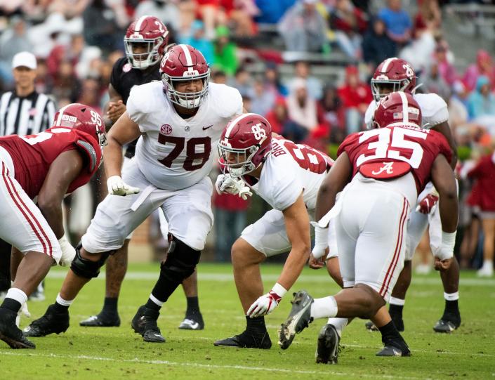 Apr 16, 2022; Tuscaloosa, Alabama, USA;  White offensive lineman Amari Kight (78) and White tight end Elijah Brown (85) move to block during the A-Day game at Bryant-Denny Stadium. Mandatory Credit: Gary Cosby Jr.-USA TODAY Sports