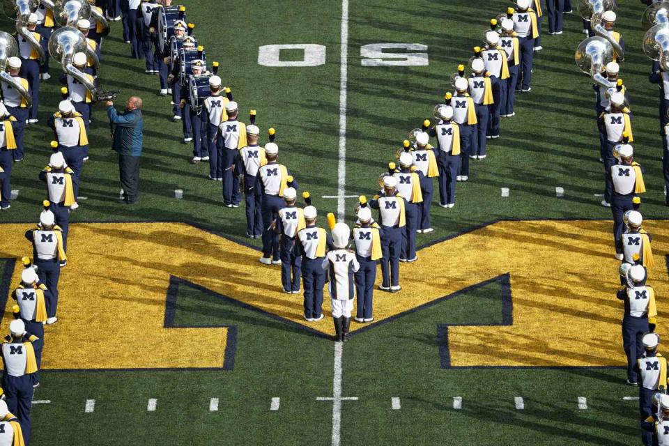 <p>Jeff Haynes /Sports Illustrated via Getty</p> The University of Michigan marching band