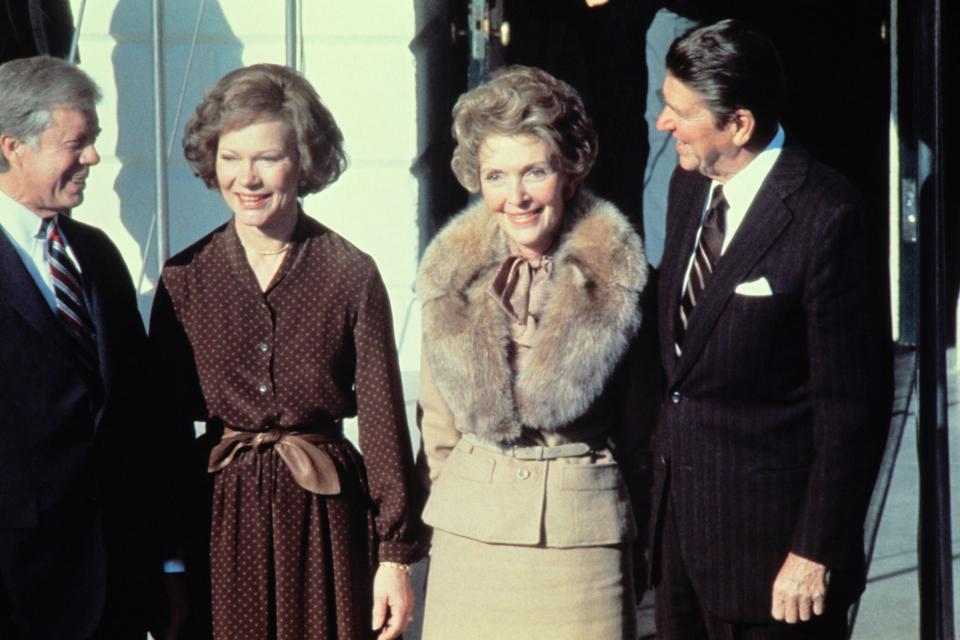 President Jimmy Carter and first lady Rosalynn Carter greet President-elect Ronald Reagan  and incoming first lady Nancy Reagan at the White House on Nov. 20, 1980.