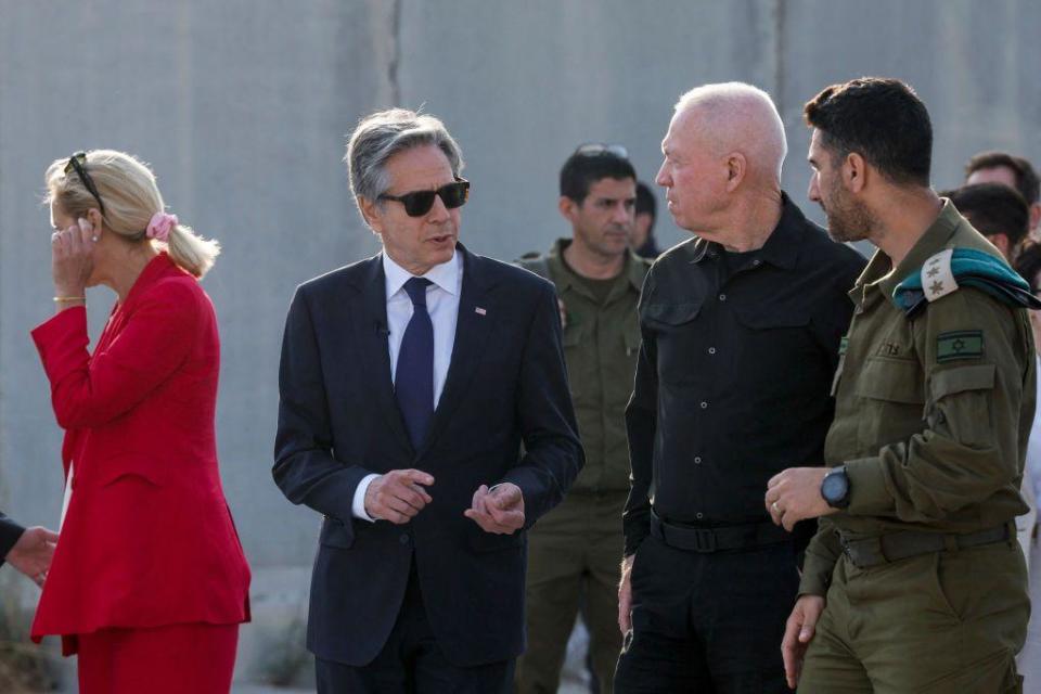 Gallant speaking with US Secretary of State Antony Blinken at the Kerem Shalom crossing between Israel and Gaza earlier this month