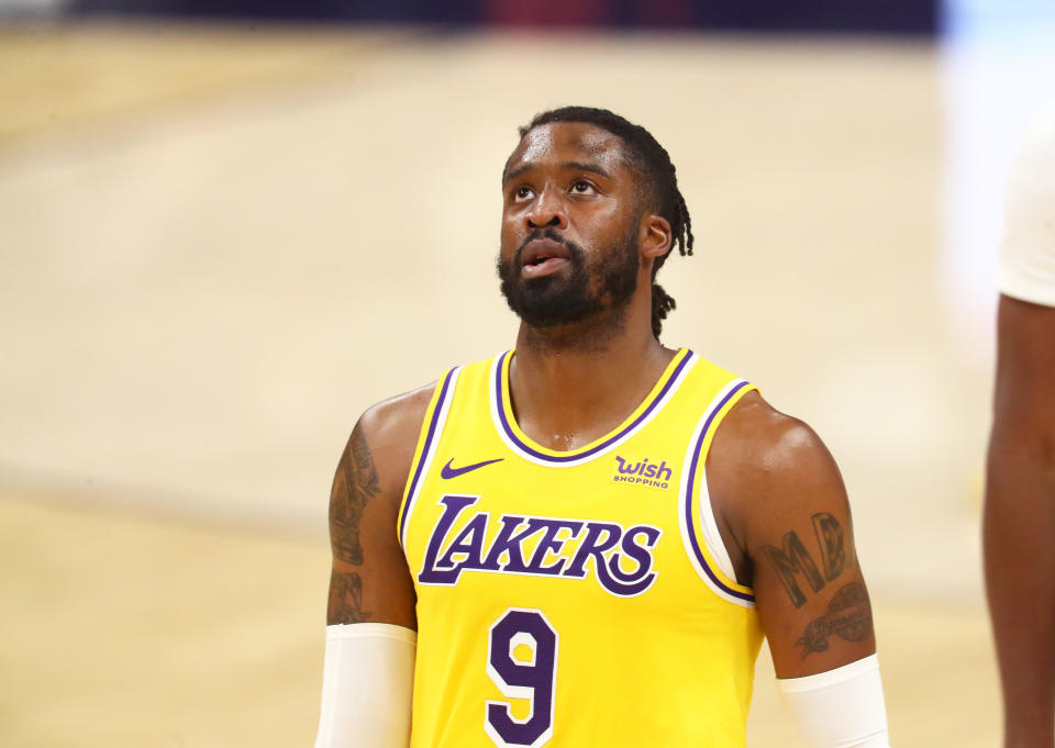 Dec 18, 2020; Phoenix, Arizona, USA; Los Angeles Lakers guard Wesley Matthews (9) against the Phoenix Suns during a preseason game at Phoenix Suns Arena. 