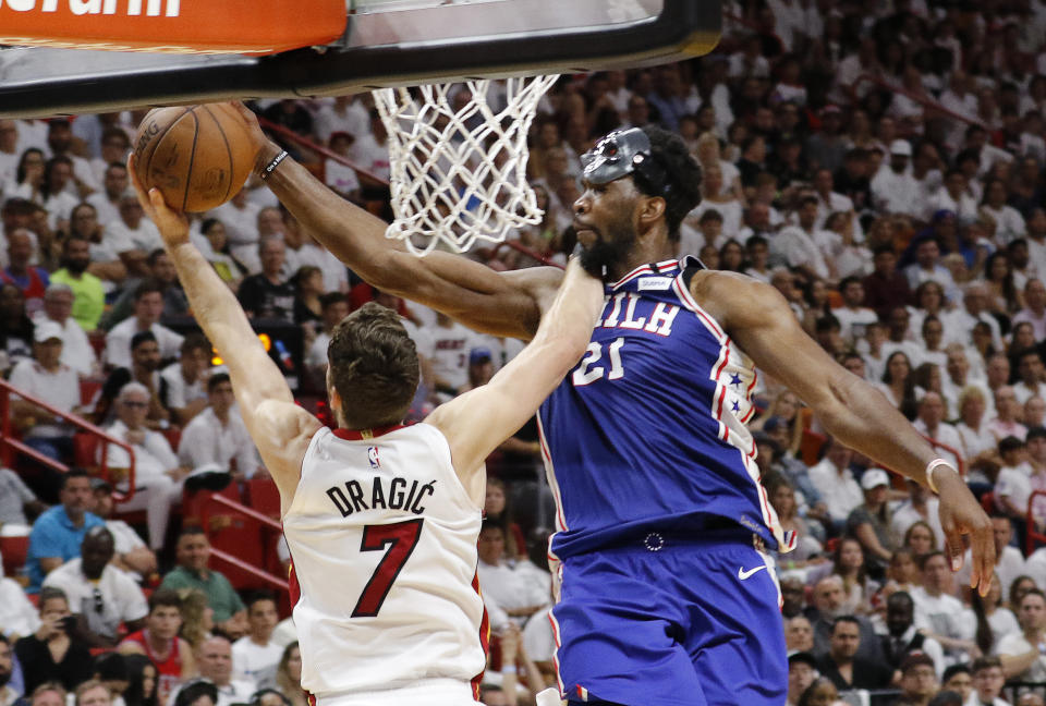 Mask or no mask, Joel Embiid's ready to take the 76ers to Round 2 ... and beyond. (AP)