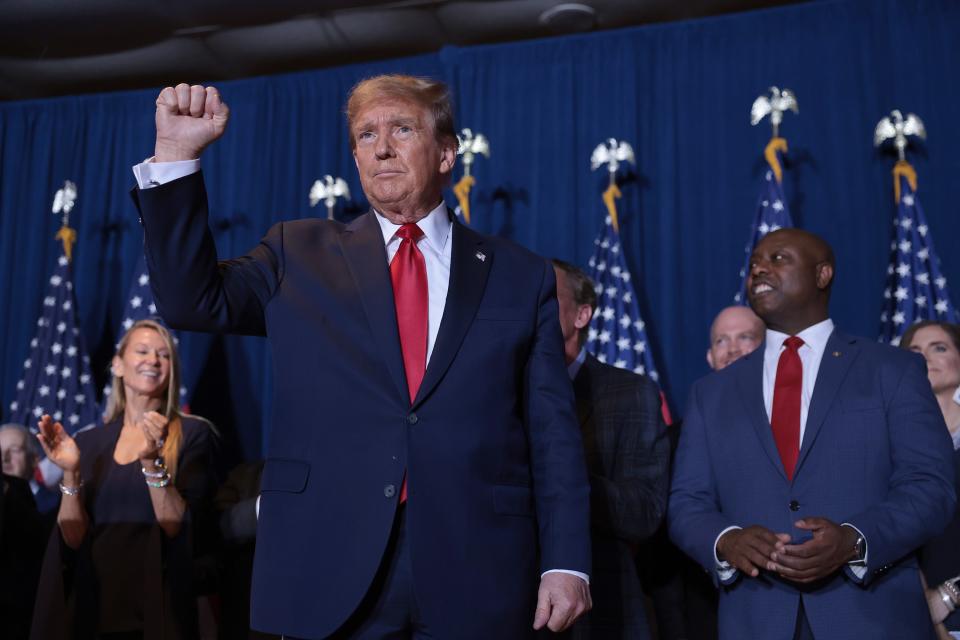 Republican presidential candidate and former President Donald Trump greets supporters during an election night watch party at the State Fairgrounds on Feb. 24, 2024 in Columbia, South Carolina. South Carolina held its Republican primary today.