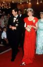 <p>That evening, the couple attends a state reception in Hobart, where Diana sports a Bruce Oldfield gown and the Spencer family tiara (<a href="https://www.elle.com/culture/movies-tv/a34692017/princess-diana-wedding-dress-explained-the-crown/" rel="nofollow noopener" target="_blank" data-ylk="slk:the very one she wore on her wedding day;elm:context_link;itc:0;sec:content-canvas" class="link ">the very one she wore on her wedding day</a>).<br></p>