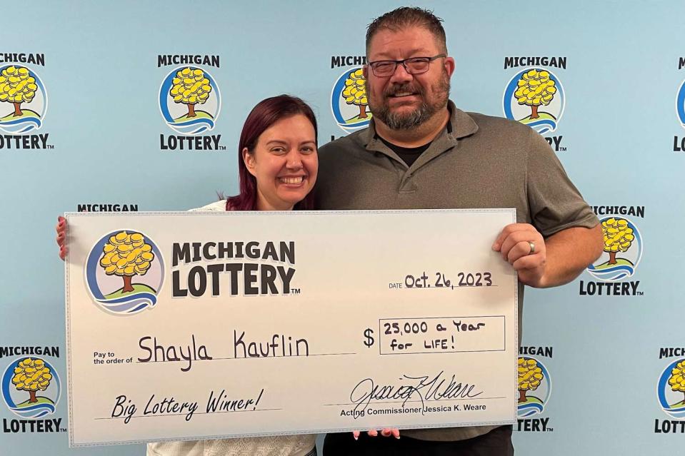 <p>Michigan Lottery</p> Michigan Lottery winner Shayla Kauflin (L) with her husband David Kauflin