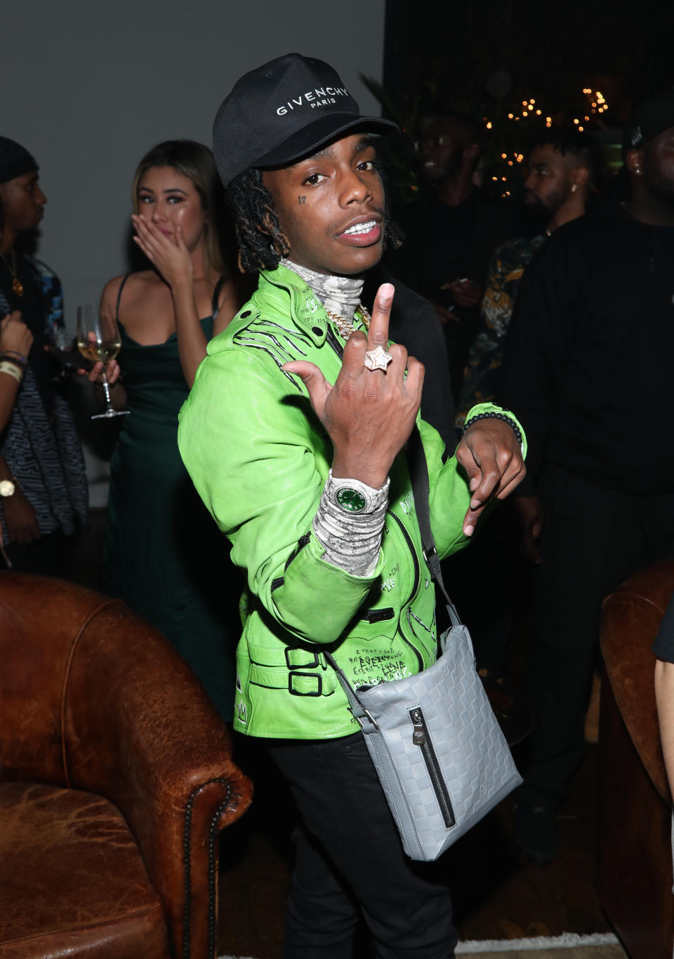 YNW Melly Wearing Green Jacket