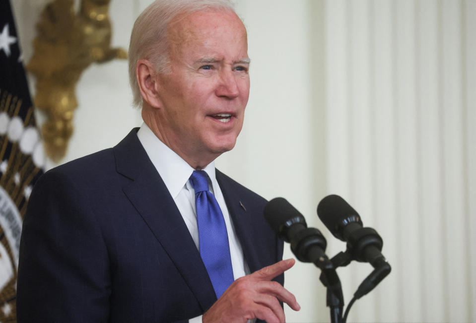 U.S. President Joe Biden speaks about infrastructure jobs and job training in broadband, construction, and manufacturing following passage of the Bipartisan Infrastructure Law, the CHIPS and Science Act and the Inflation Reduction Act during an event in the East Room of the White House in Washington, U.S., November 2, 2022. REUTERS/Leah Millis